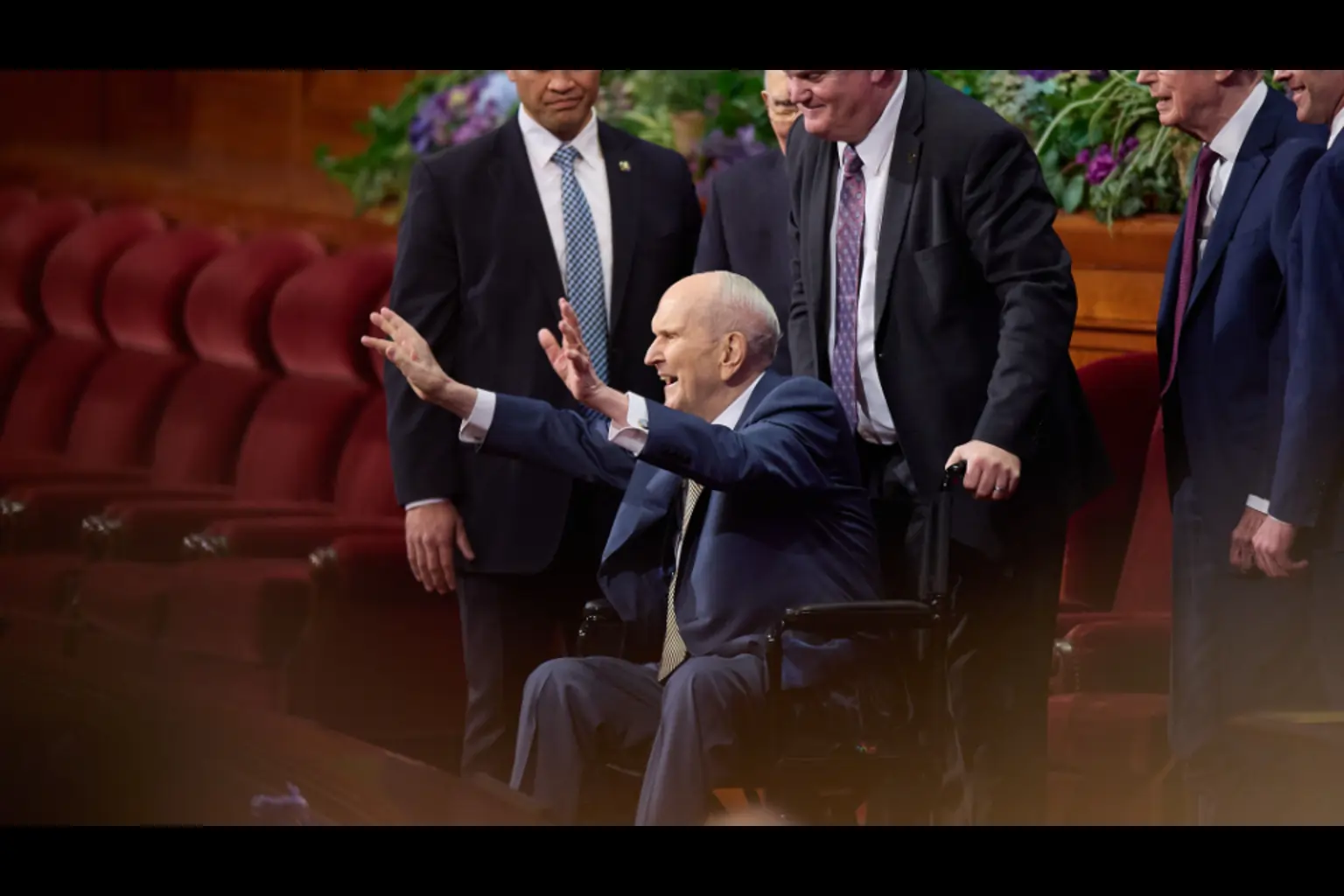 President Russell M. Nelson of the First Presidency waves to the congregation at the conclusion of the Sunday afternoon session of general conference at the Conference Center in Salt Lake City, Utah, on April 6, 2025., church